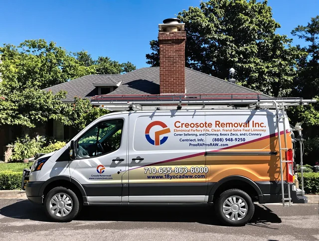 Palm Beach Gardens Chimney Sweep technician removing creosote safely in Palm Beach Gardens, FL